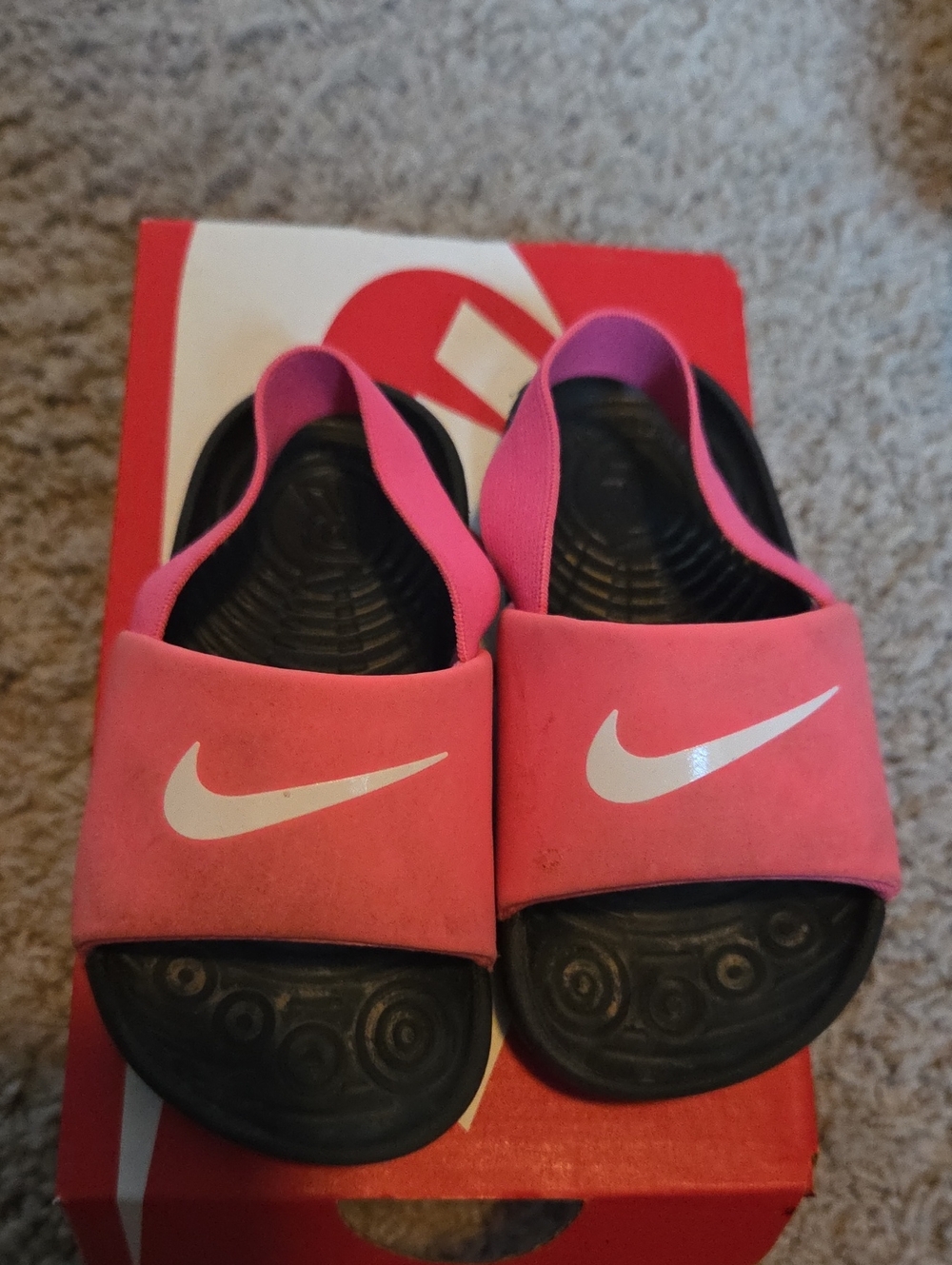 Nike Kids Pink Slide Sandals with White Swoosh and Black Footbed